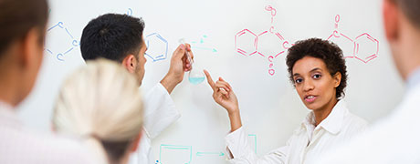 A group of healthcare professionals engaged in a medical lesson